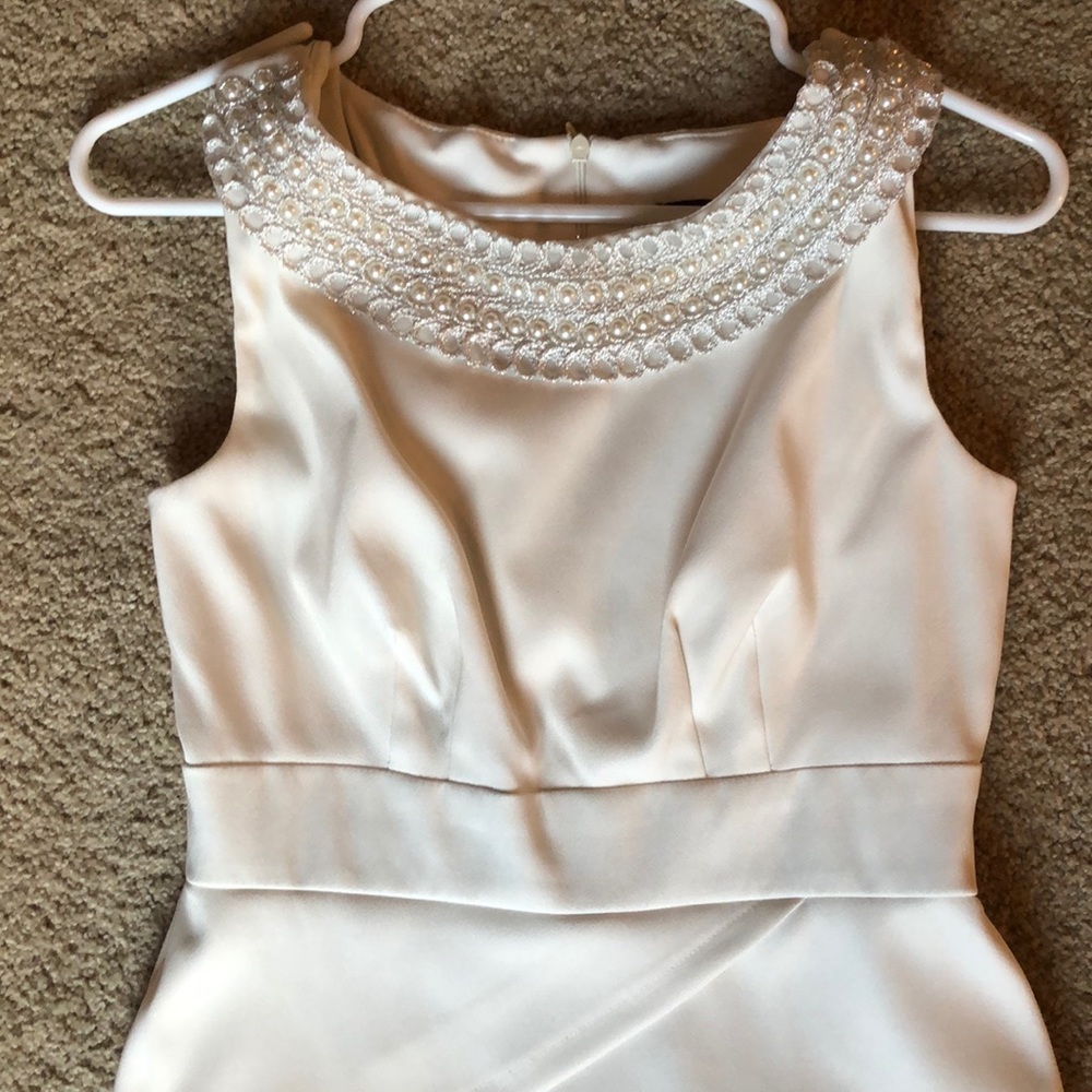 Ivory cocktail dress with pearl collar